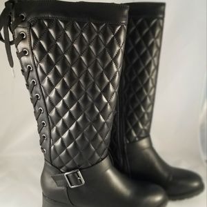 Black lace up boots. Quilted pattern